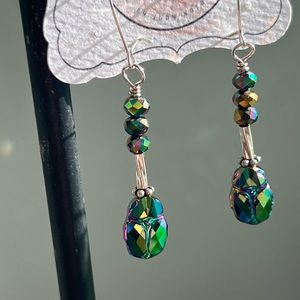 Crystal scarab earrings.
